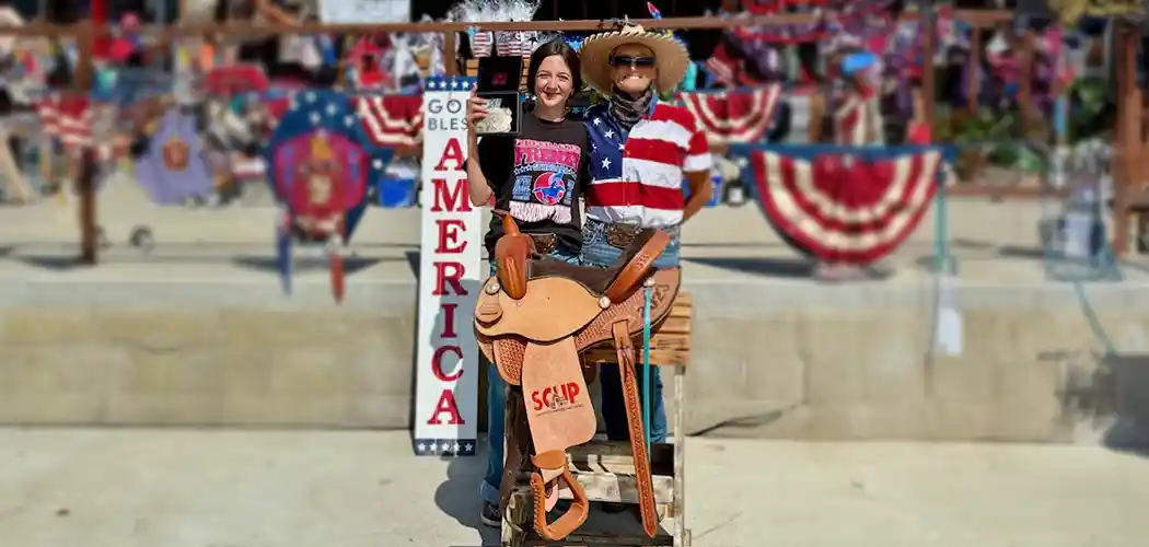 child-riding-a-horse-in-an-arena-at-a-tri-county-riders-event