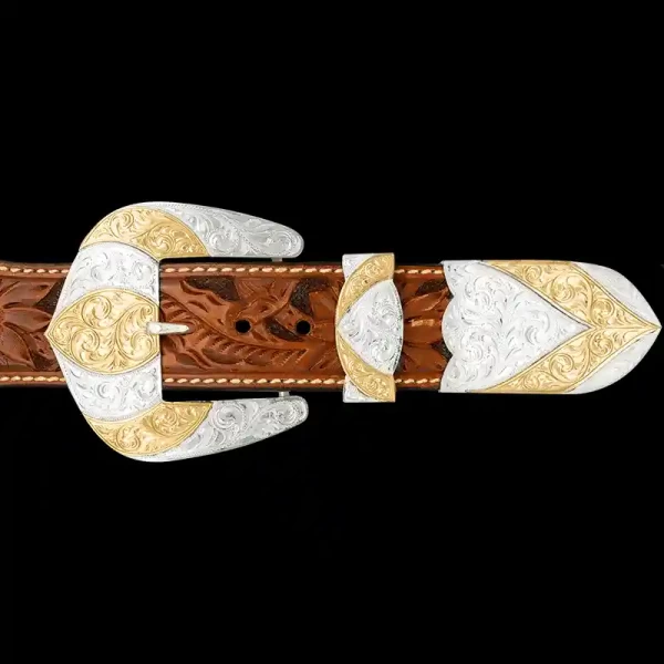 A custom western three piece betl buckle set featuring a silver plated base and golden bronze accents