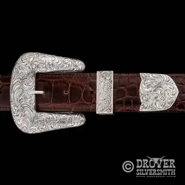 A sterling silver belt buckle set featuring a huge buckle, loop and tip. 