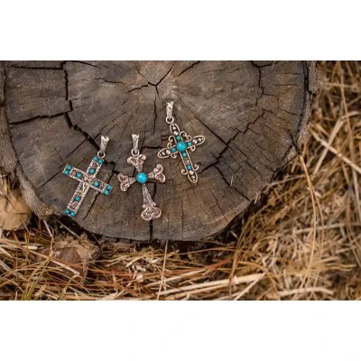 Silver Large Cross Pendant with chain for women over a log