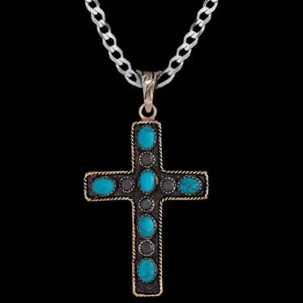 A custom silver cross pendant necklace for men and women, western-inspired design. featuring turquoise stones 