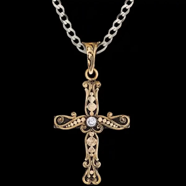 A custom bronze cross pendant necklace for men and women, western-inspired design. featuring bronze dots and a white zirconia stone