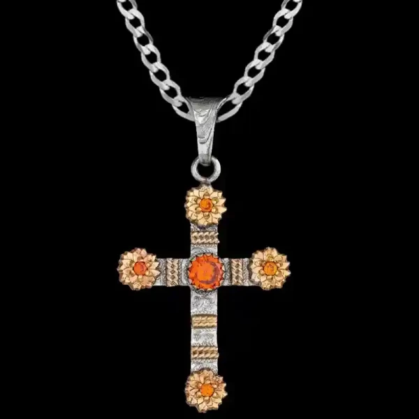 A custom silver cross pendant necklace for men and women, western-inspired design. featuring bronze flowers and orange zirconia stone