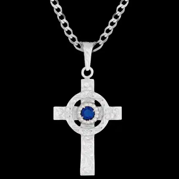 A custom silver celtic cross pendant necklace for men and women, western-inspired design. featuring blur zirconia stone 