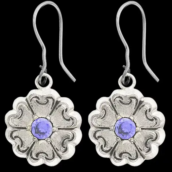 A pair of silver western earrings for women, flower shaped, with purple zirconia stones 