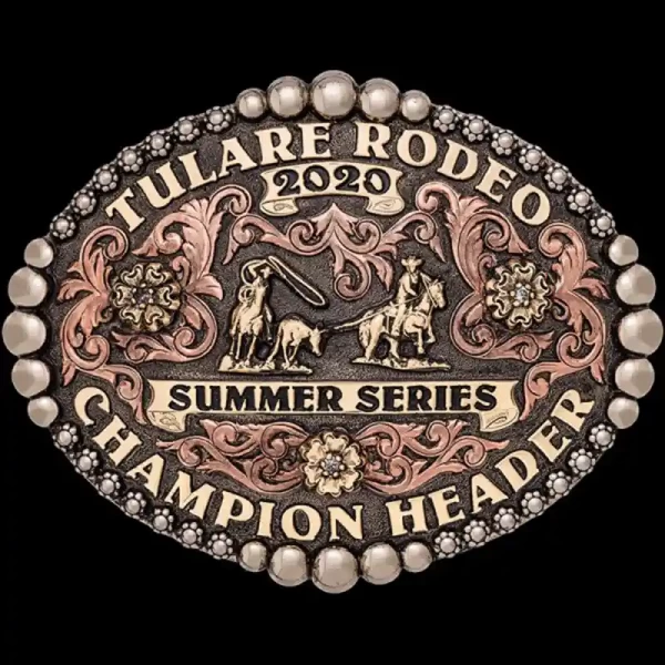 A custom oval rodeo belt buckle trophy for Tulare Rodeo Summer Series Champion Header featuring a team roping figure