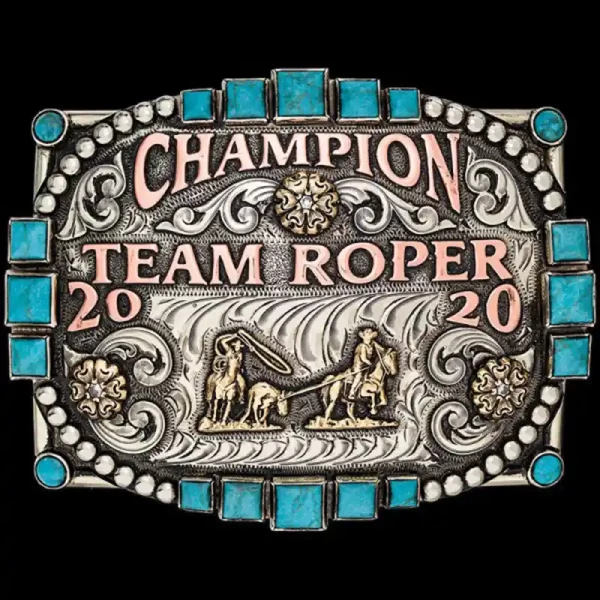 A custom silver and turquoise rodeo belt buckle trophy featuring a team roping figure 