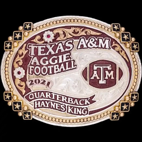 A custom graduation belt buckle for Texas A&amp;M University  Quarterback graduate featuring a footbail ATM logo 
