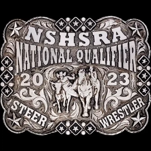 A custom silver rodeo belt buckle for NSHSRA National Qualifier featuring a steer wrestler cowboy figure
