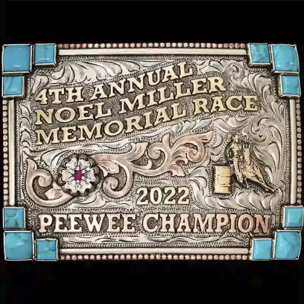 A custom rodeo belt buckle for Noel Miller Memorial Race Peewee Champion featuring a barrel racing cowgirl figure