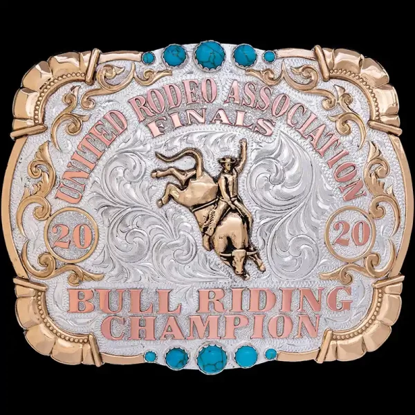 A custom rodeo belt buckle trophy for United Rodeo Association Bull Riding Champion featuring a bull rider figure and turquoise stones