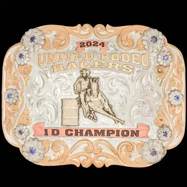 A custom women's rodeo belt buckle trophy for United Rodeo Racers 1D Champion featuring a barrel racing cowgirl figure 