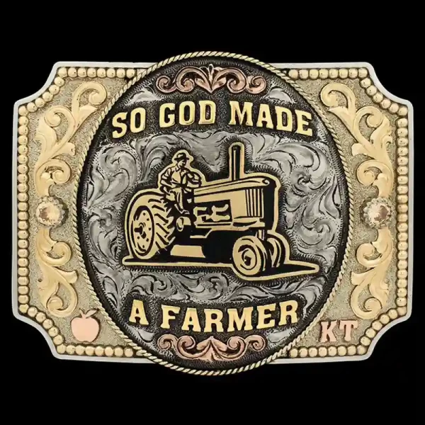 A custom farming belt buckle designed by Kait Thornton featuring a farmer on a truck figure