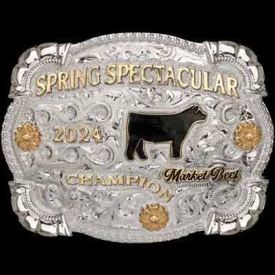 A custom silver plated farming belt buckle trophy for Spring Spectacular Champion featuring a cow figure
