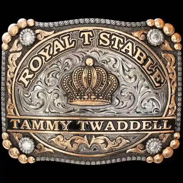 A custom square rodeo queen belt buckle for Royal T Stable featuring a golden crown figure