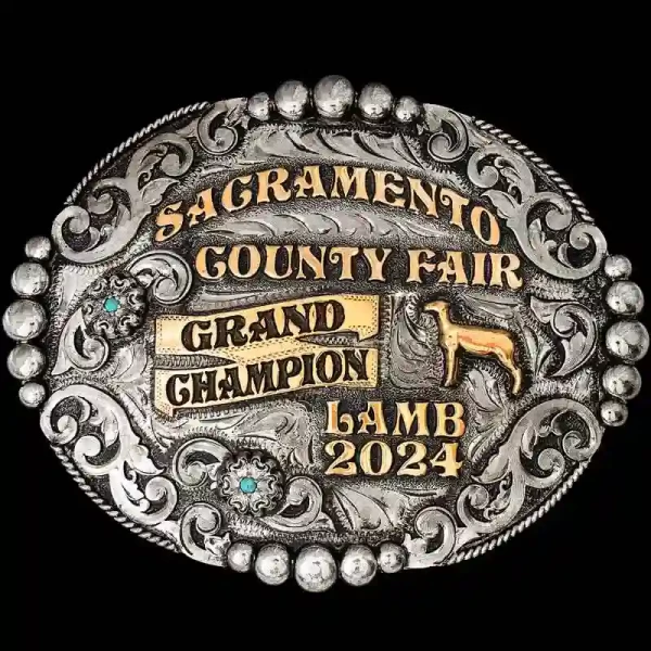 A custom oval lamb belt buckle trophy for Sacramento County Fair Grand Champion featuring a lamb figure 