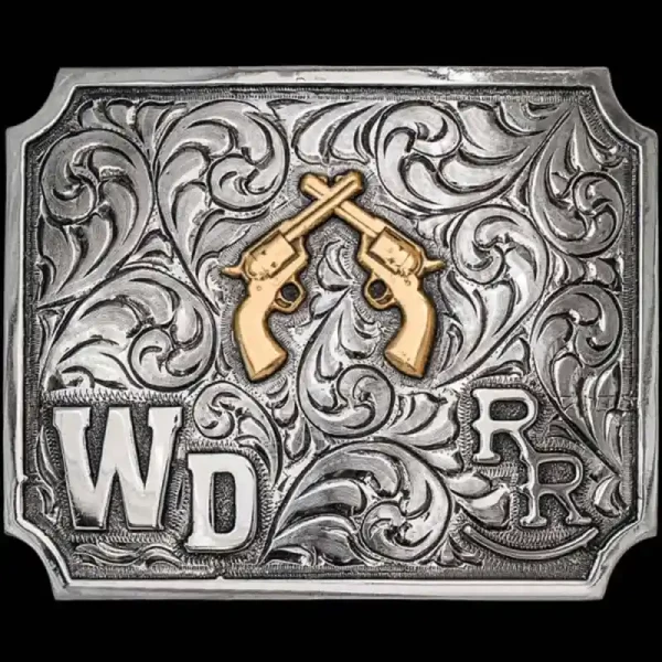 A custom silver square western belt buckle featuring a crossed guns figure and two custom ranch brand logos