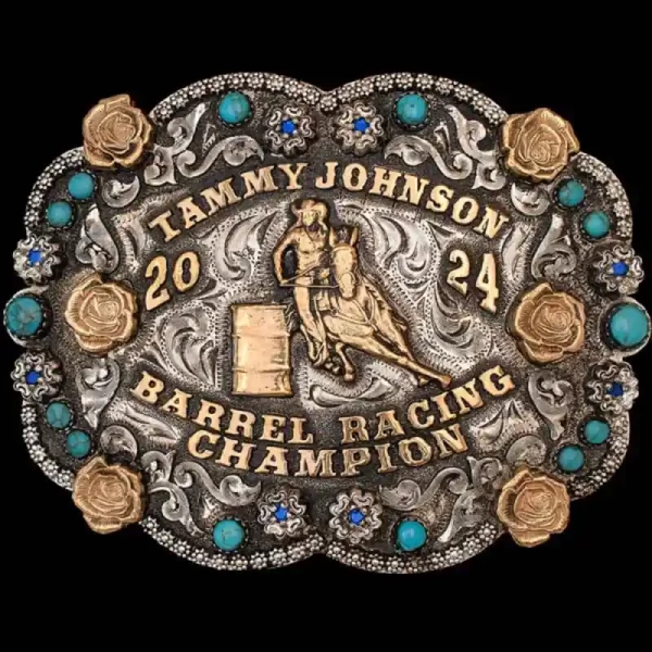A custom women's rodeo belt buckle featuring a barrel racing cowgirl figure and personalized name, with turquoise stones