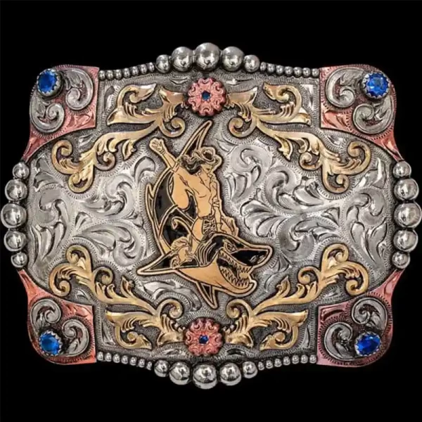 A custom women's belt buckle featuring a shark riding cowgirl figure 