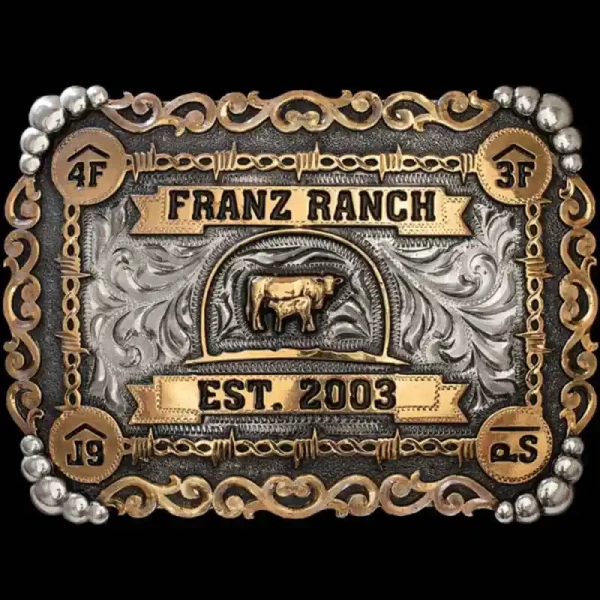 A custom square ranch belt buckle featuring cow and calf figure