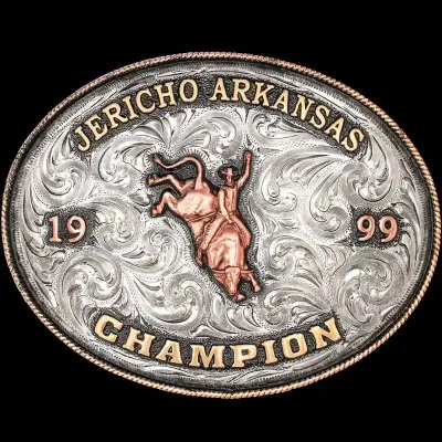 A custom oval rodeo belt buckle trophy for Jericho Arkansas Champion featuring a bull rider figure
