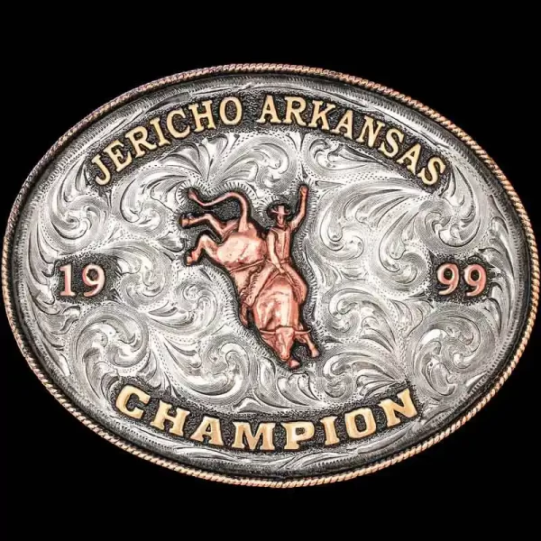 A custom oval rodeo belt buckle trophy for Jericho Arkansas Champion featuring a bull rider figure