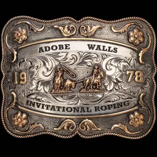 A custom rodeo belt buckle for Adobe Walls Invititational Roping featuring a team roping figure 