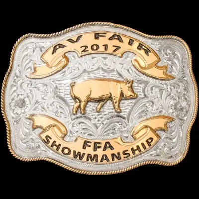 A custom award belt buckle for AV Fair FFA Championship featuring a golden bronze pig figure 
