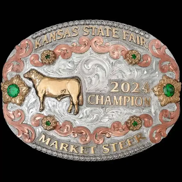 A custom oval trophy belt buckle for Kansas State Fair Market Steer Champion featuring a cow figure 