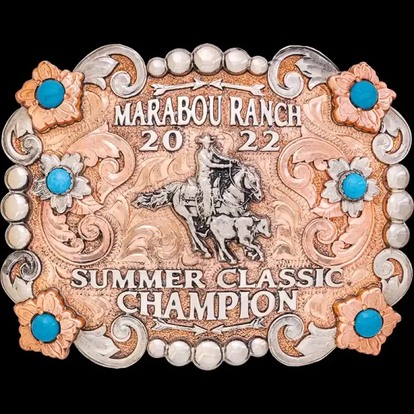 A custom rodeo belt buckle trophy for Marabou Ranch Summer Classic Champion feauring a copper base with a calf roping figure 