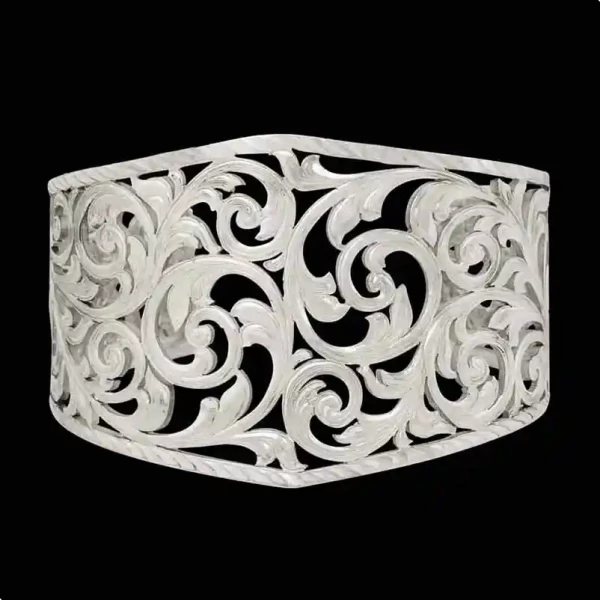 A women's cuff bracelet featuring western filigrane in natural finish