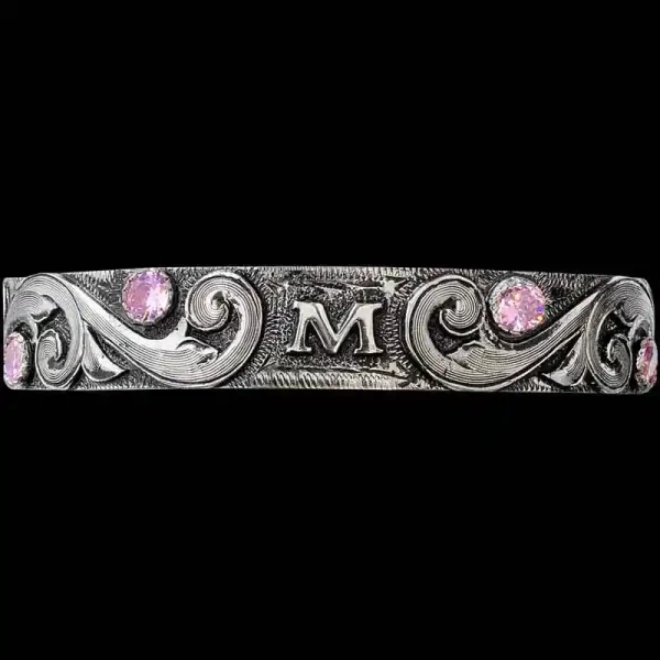 A silver cuff bracelet for men and women featuring a personalized initials and scrollwork 