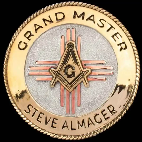 A custom silver and bronze concho in dual matted and natural finish featuring rope edge and personalized logo