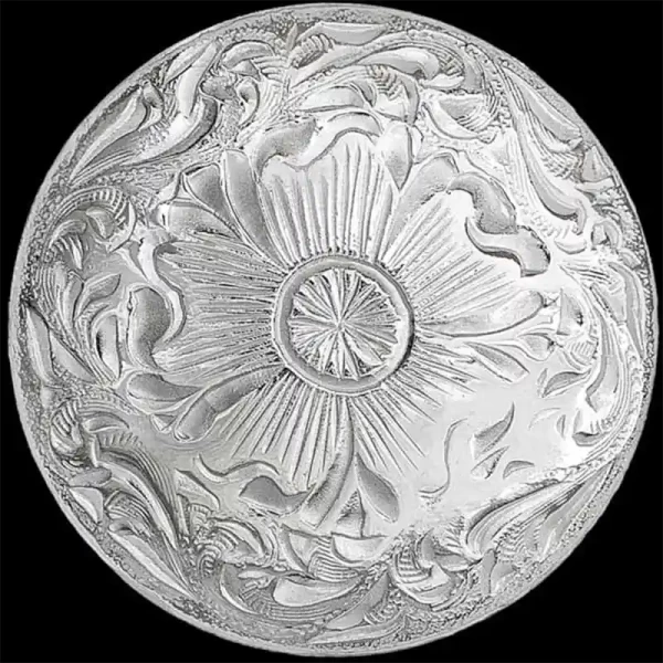 A hand engraved custom silver concho in natural finish featuring a violet figure 