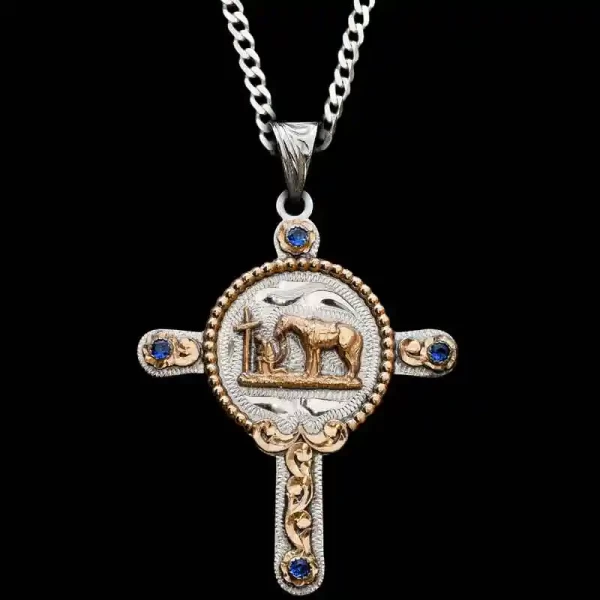 A custom silver cross pendant necklace for men and women, western-inspired design. featuring praying cowboy figure 