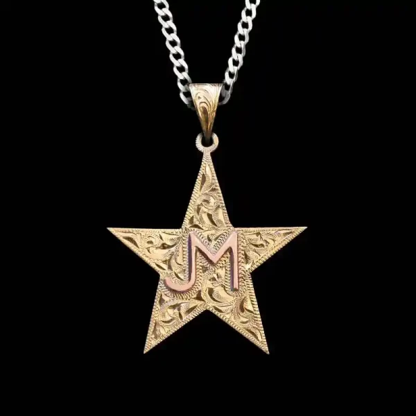 A custom pendant necklace featuring a golden star shape, a copper personalized ranch brand, with a sterling silver chain 