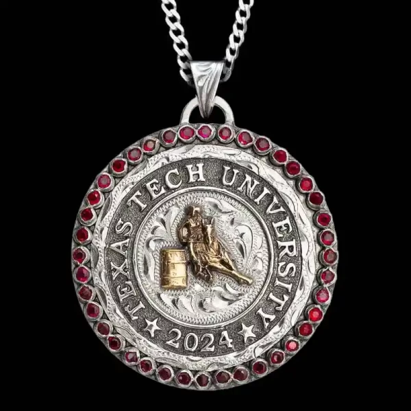 A custom pendant necklace for graduations featuring a barrel racing figure and custom silver lettering, with a sterling silver chain 