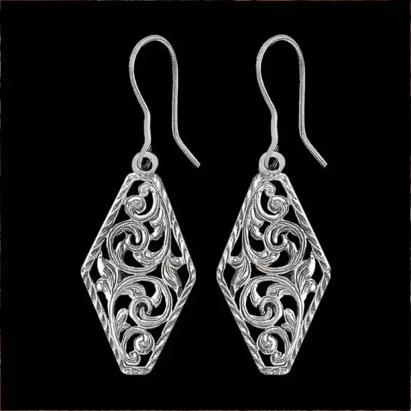 A pair of silver western earrings for women, hexagonal shaped, with filigrane details, antique finish