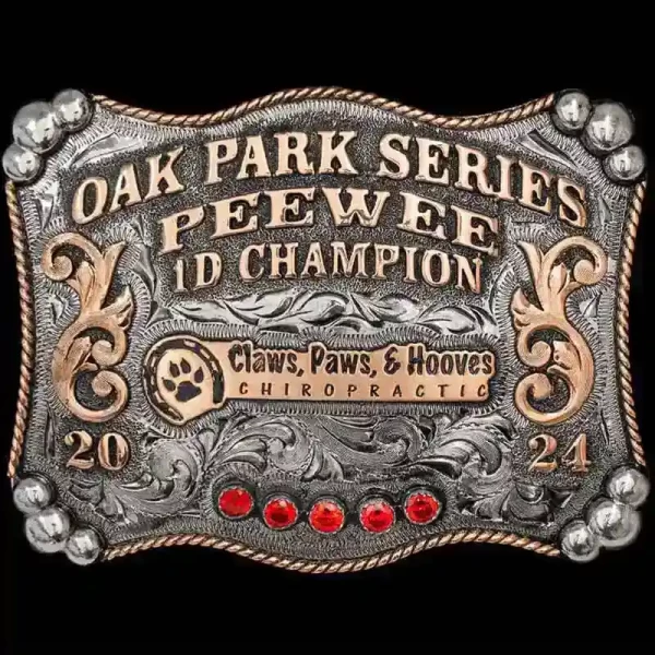 A custom peewee belt buckle for Oak Park Series Peewee 1D Champion featuring Claws, Paws, and Hooves Chiropractic custom logo