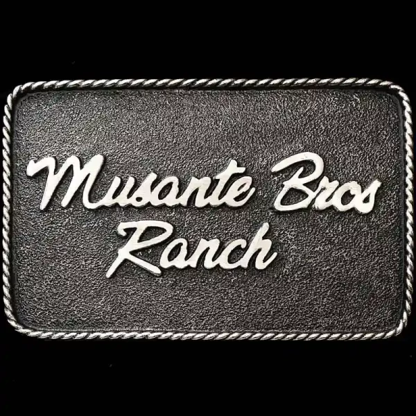 A custom antiqued silver ranch belt buckle for Musante Bros Ranch 