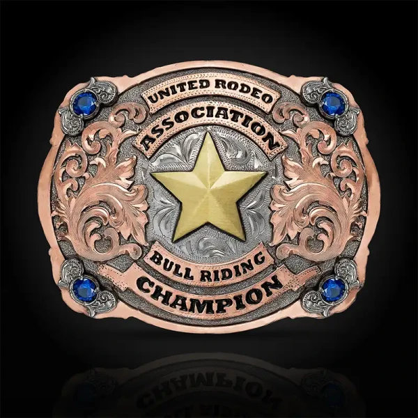 A custom oval western belt buckle featuring a longhorn figure 