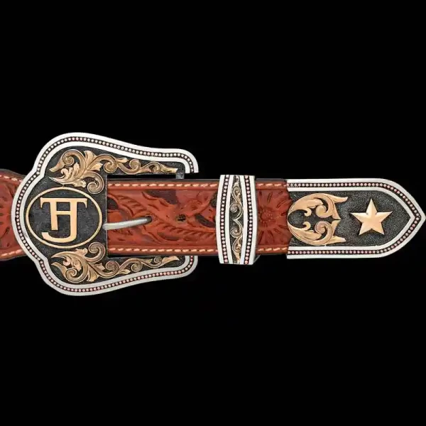 A custom western three piece belt buckle set featuring a personalized ranch brand and a golden star figure 