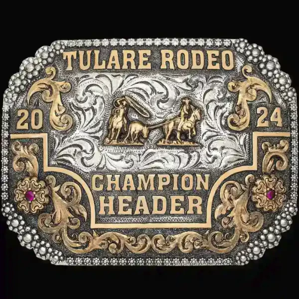 A custom rodeo belt buckle trophy for Tulare Rodeo Champion header featuring a team roping figure 