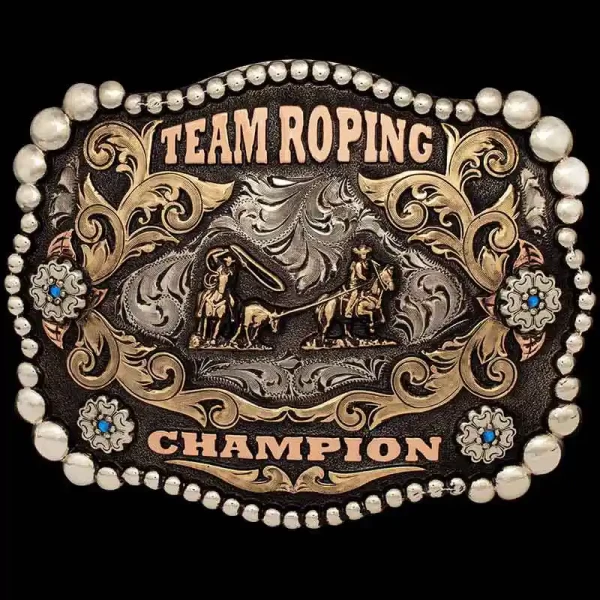 A custom team roping belt buckle featuring a team roper figure 