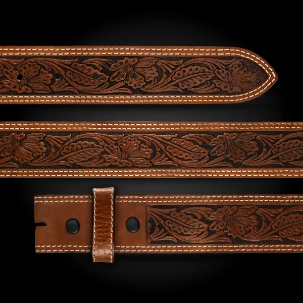 A brown full grain leather belt for women featuring tooled floral pattern 