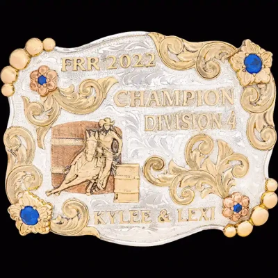 A custom silver plated women's rodeo belt buckle featuring a barrel racing cowgirl figure 