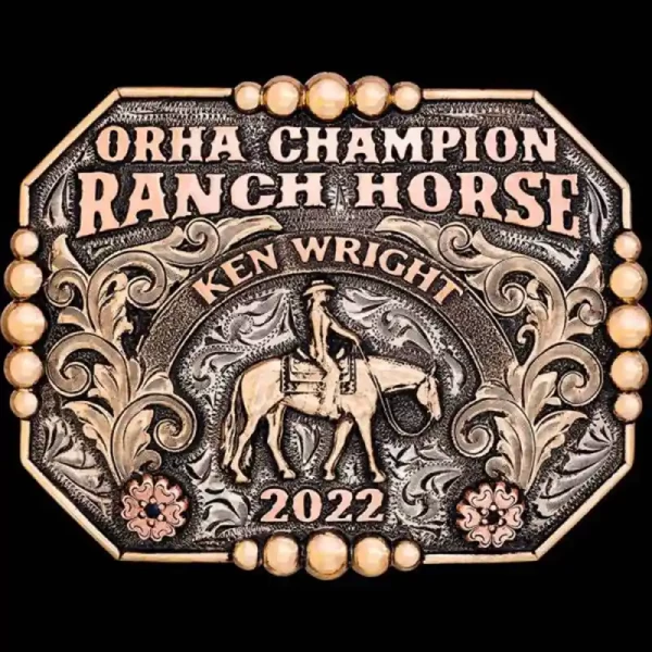 A custom western pleasure belt buckle trophy for ORHA Ranch Horse Champion featuring a cowgirl figure