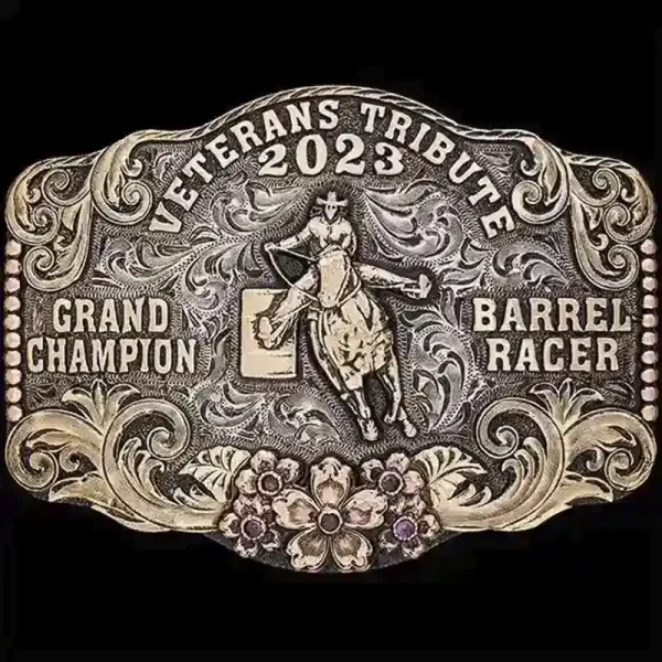 A custom women's rodeo belt buckle trophy for Veterans Tribute Grand Champion featuring a barrel racer cowgirl figure 