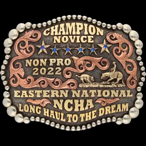 A custom trophy belt buckle for Eastern National NCHA Novice Champion featuring a cutting figure and golden stars 