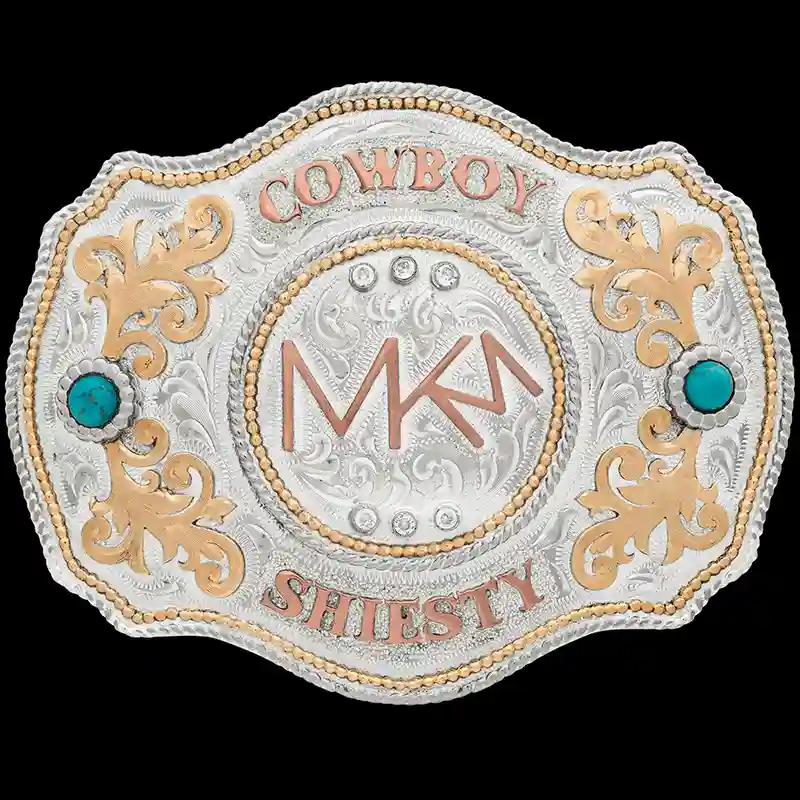 A custom silver western belt buckle featuring a custom ranch brand 